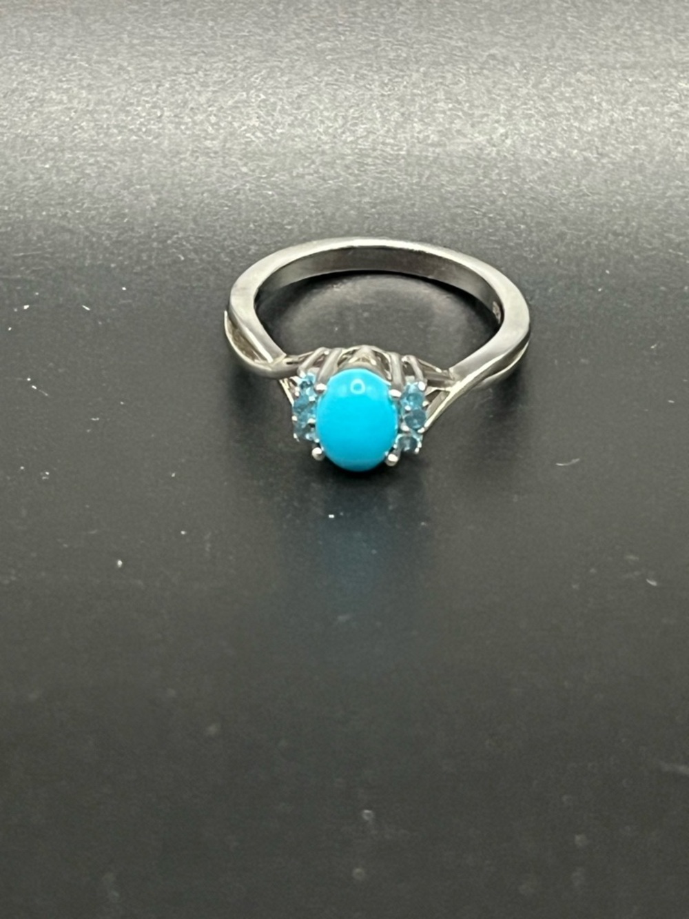 Sterling Silver Turquoise Cabochon Ring with Blue Accent Stones